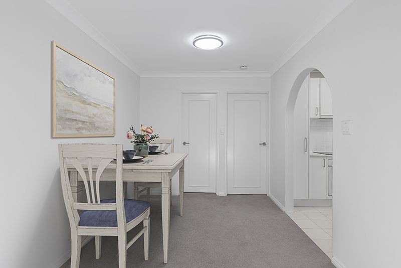 An elegant, fully renovated one-bedroom unit overlooking gardens.