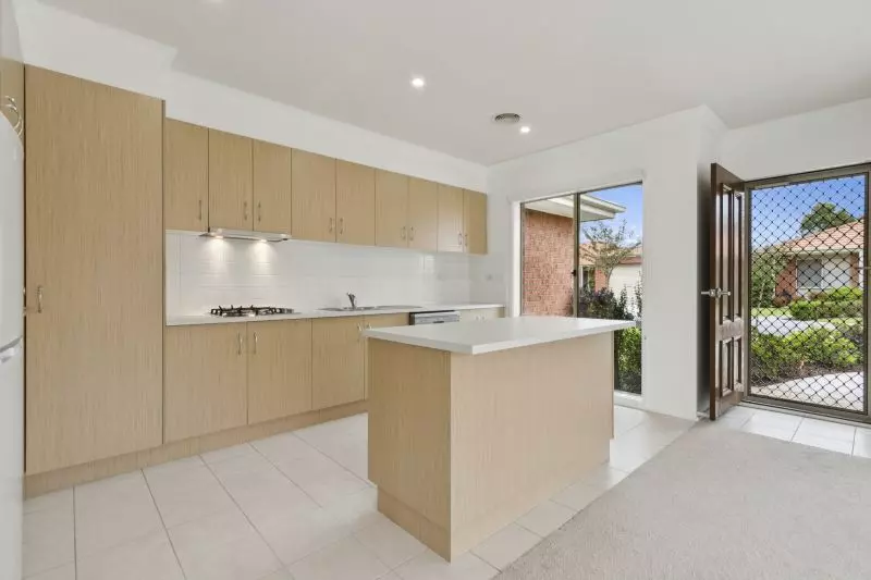 Enjoy serene living in this modern two-bedroom villa